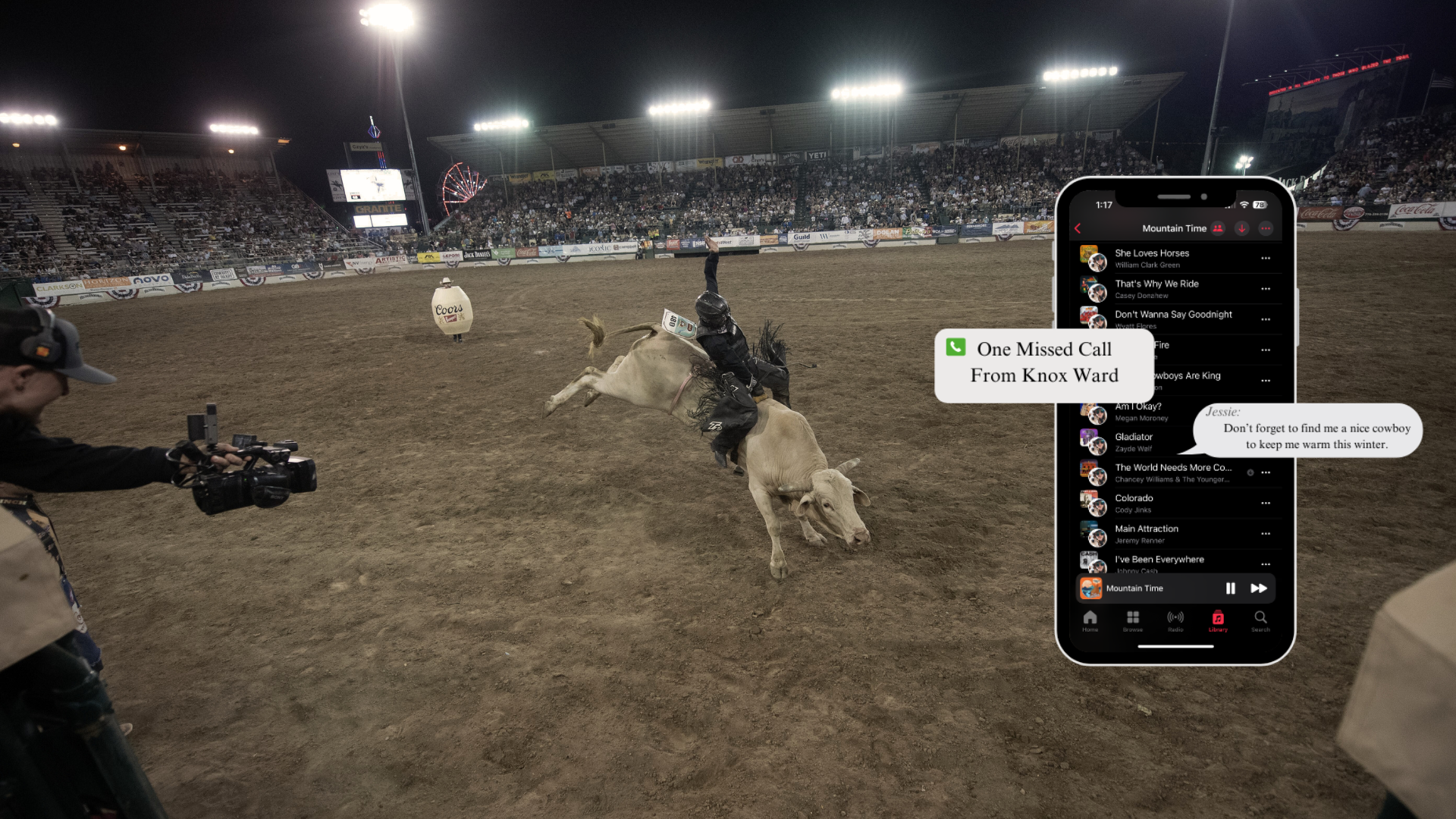 a man riding a bull in a rodeo arena with a phone showing texts and music playlist 